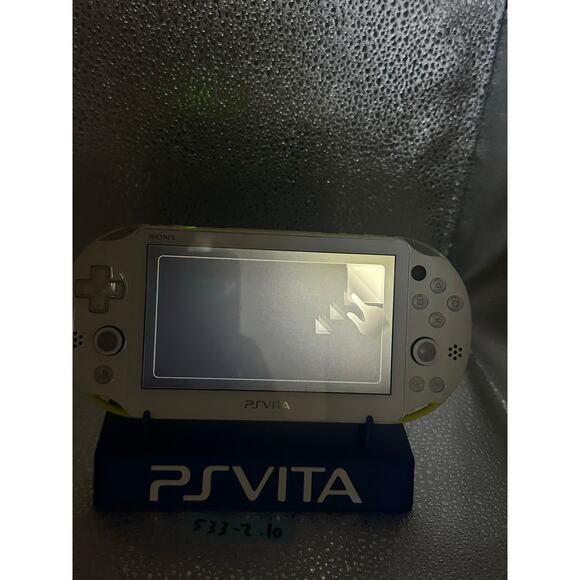white/yellow with a dash of light blue ps vita 2000 w/charger - Picture 4 of 8